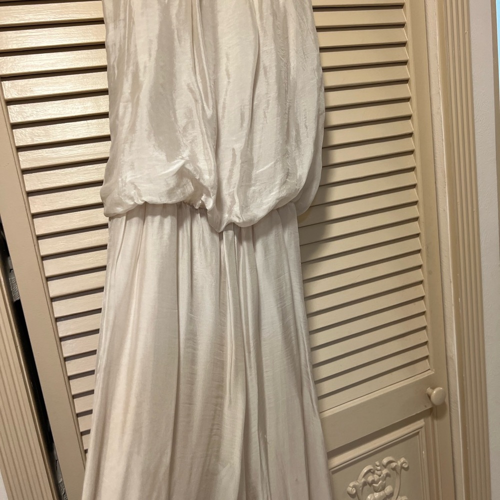 Women’s silk jumpsuit with elastic waist. Cream color M/L